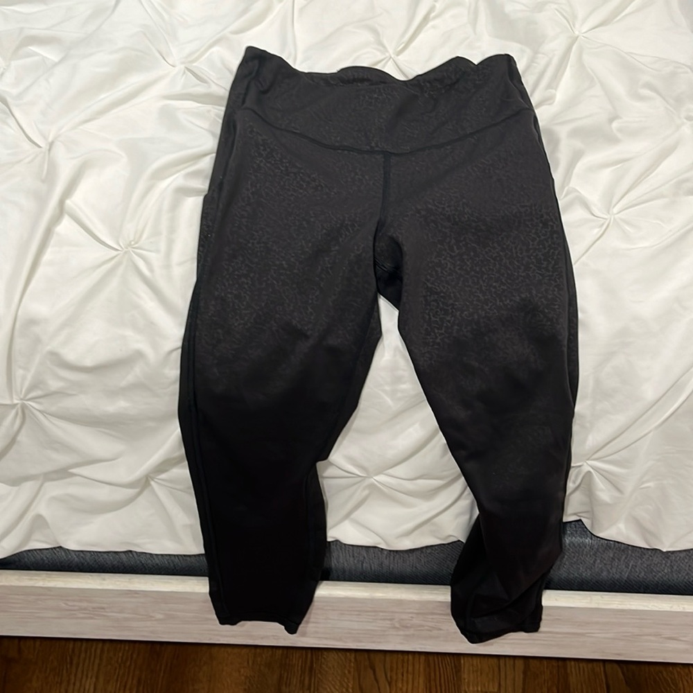 Athleta leggings with a leopard-print-like design